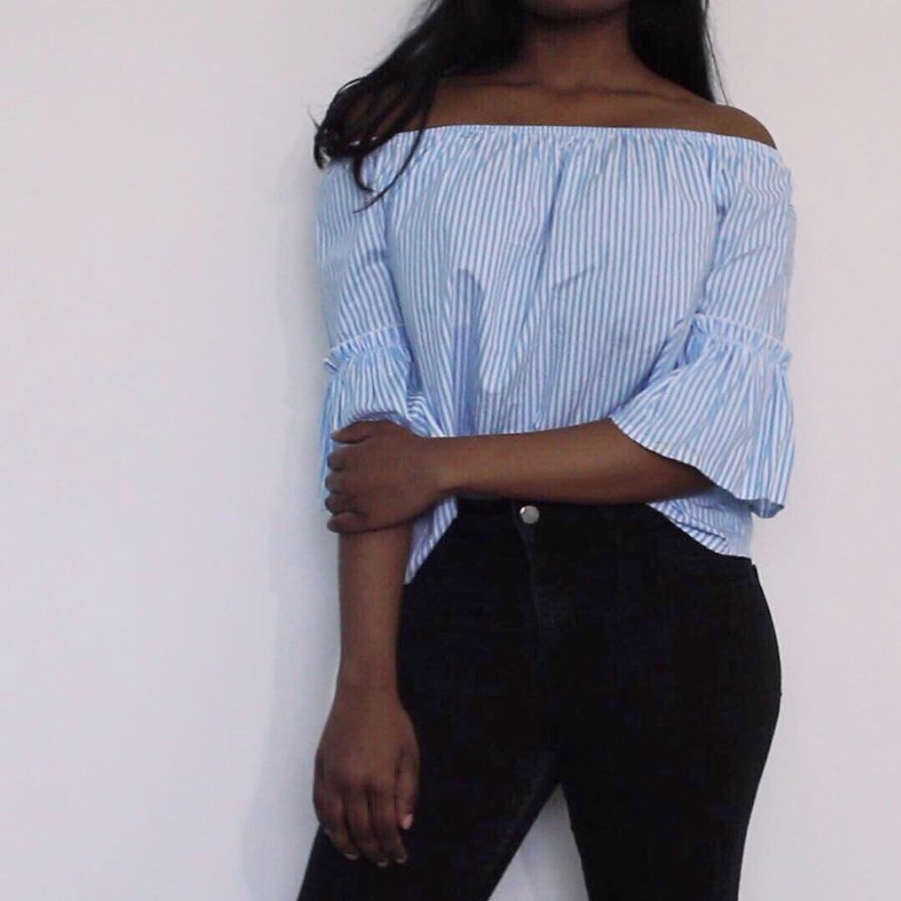 off the shoulder pinstriped blue and white blouse